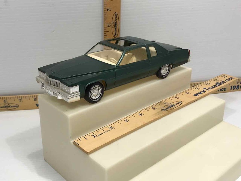 lot 603 image: Dealership Promo  Vintage Johan 1977 Cadillac 125 Sclae Built Up Plastic (Edinburgh green)