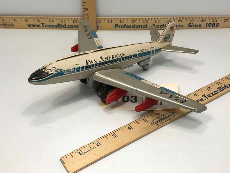 lot 703 image: Vintage 1960s Pan American Clipper Meteor Friction Airplane N-801 PA Toy