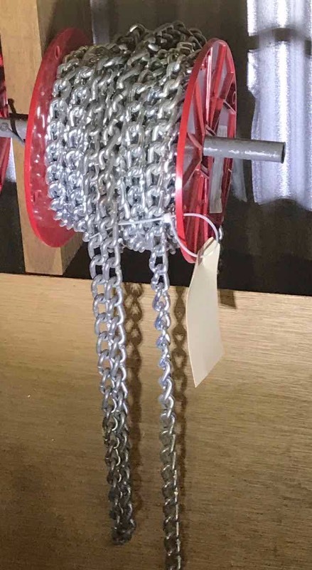 lot 35 image: Spool of chain  twisted link (unknown length)
