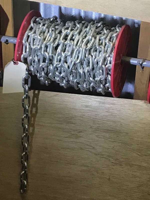 lot 36 image: Spool of chain  14 inch coil chain, (unknown length)