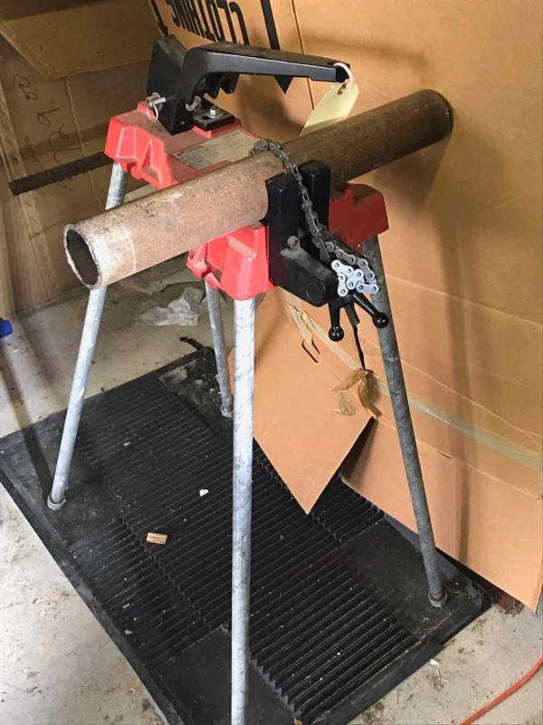 lot 52 image: Milwaukee metal band saw stand  and mat (saw not included)