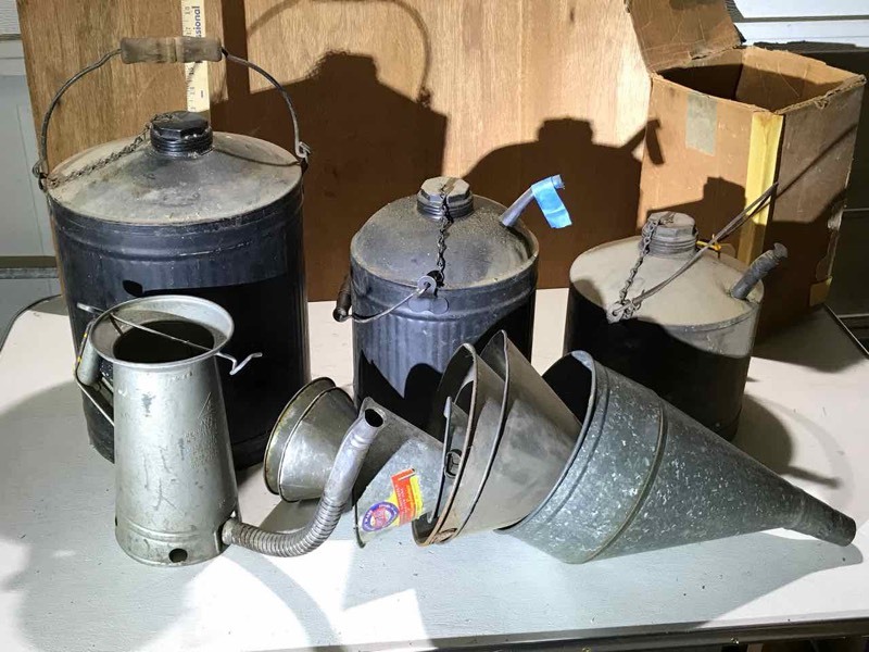 lot 130 image: (3) Vintage fuel cans and (6) funnels, Metal Oil Can with Spout