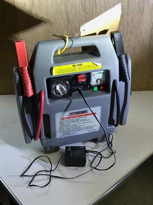 lot 143 image: Non working battery booster (needs new battery), has charger
