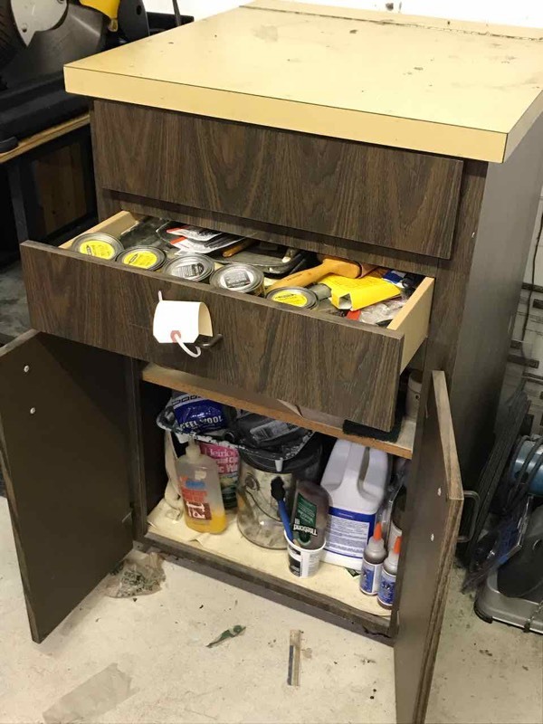 lot 200 image: Cabinet on casters with paints, varnishes, glues, etc.