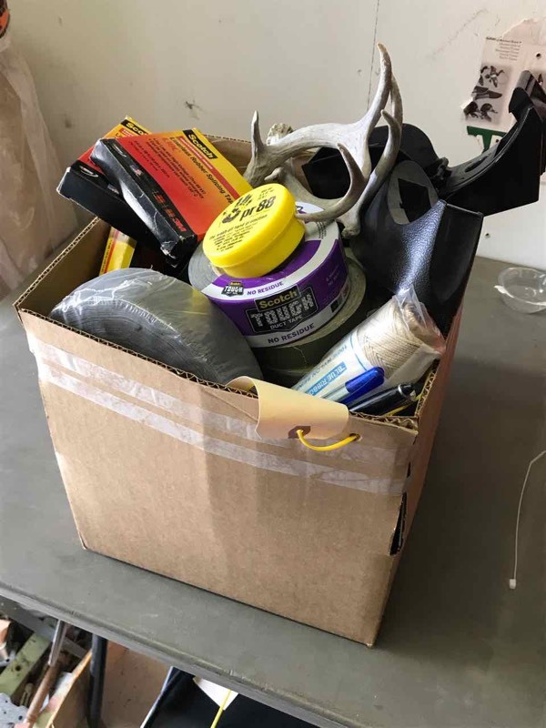 lot 273 image: Box of assorted tape  Duct tape, electrical tape, packing tape, etc.