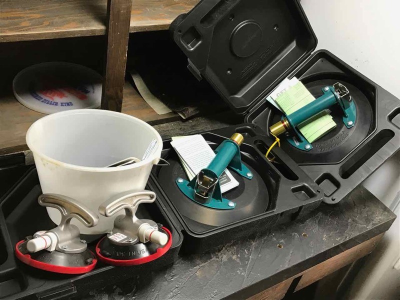 lot 303 image: (2) Power Grip Vacuum Cups, (2) smaller powergrip glass cups (plate glass holding tools)