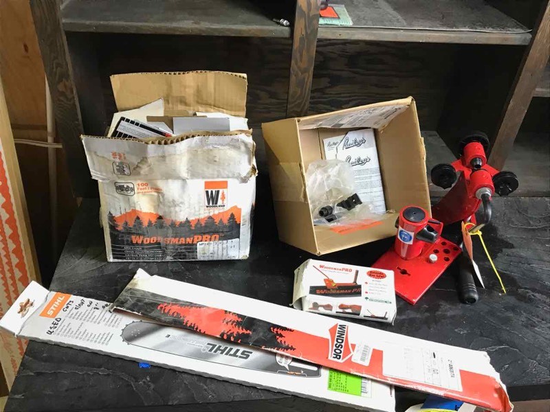 lot 306 image: Chain Saw Bars, Chains, Chain Saw Blade Maker,  16� in.� Stihl Bar, 20� in.� bar, Chainsaw Breaker, Chain connector, roll of bar chain, blade measuring board