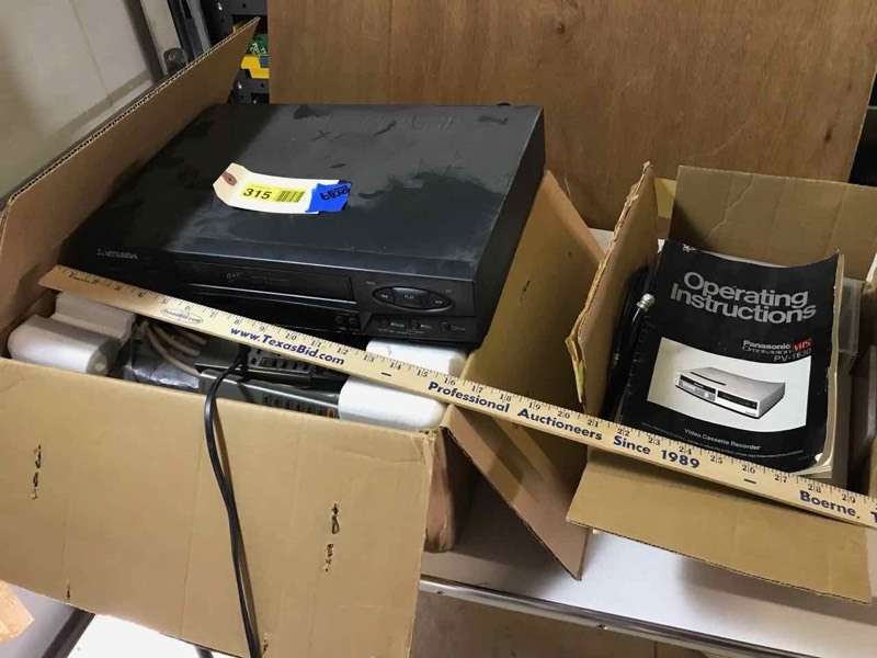 lot 315 image: Two VCR�s and box of tapes