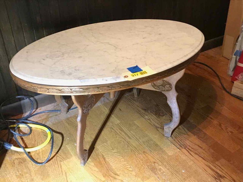 lot 317 image: Marble Top Oval Coffee Table. (37� in. x 25� in. x 18-12� in.� tall)