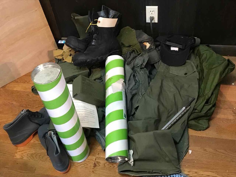lot 323 image: Military Clothing  boots, hats, pants, goggles, contamination suit, etc.