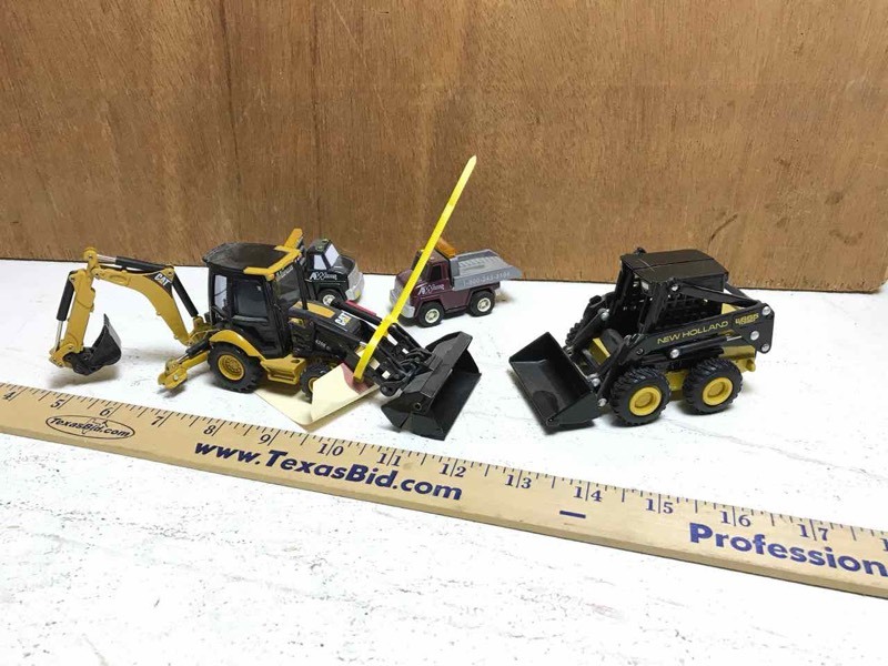 lot 342 image: Miniature Die-Cast trucks, skid steer and backhoe