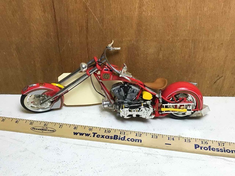lot 343 image: Miniature die-cast metal Chopper with Fire Department logo,  12� in. long x 5� in. tall