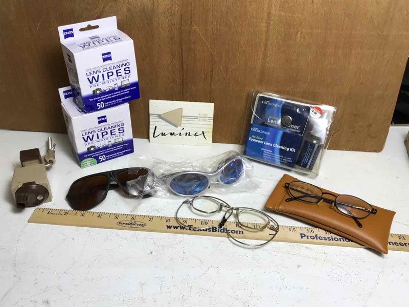 lot 346 image: Box of assorted glasses, lens cleaners, etc.