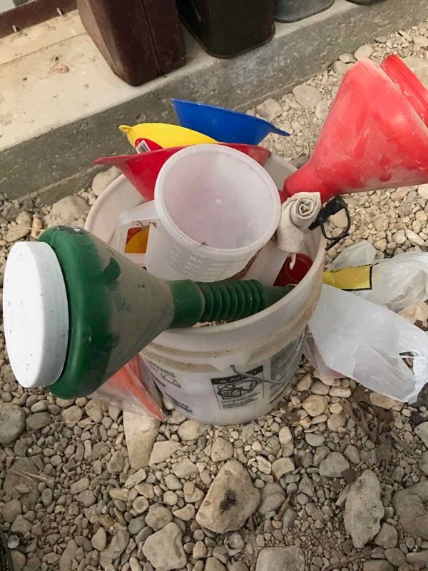 lot 537 image: Bucket of assorted funnels