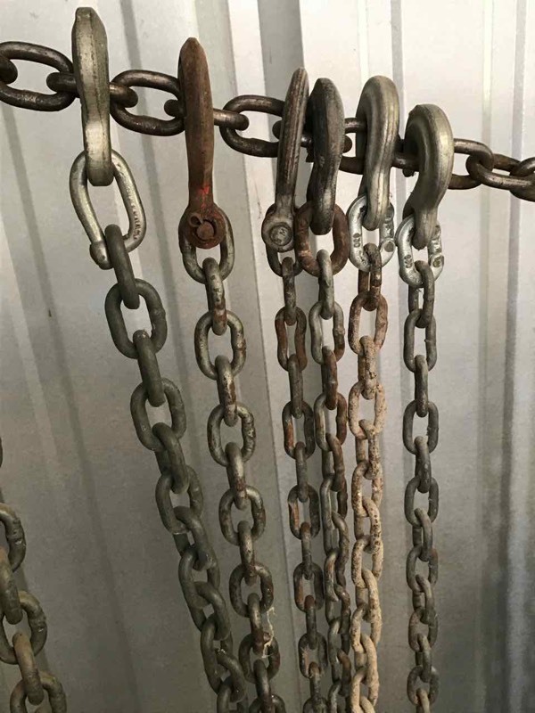 lot 543 image: Chains (3), one -316, two-18 in. 8 ft long, with hooks