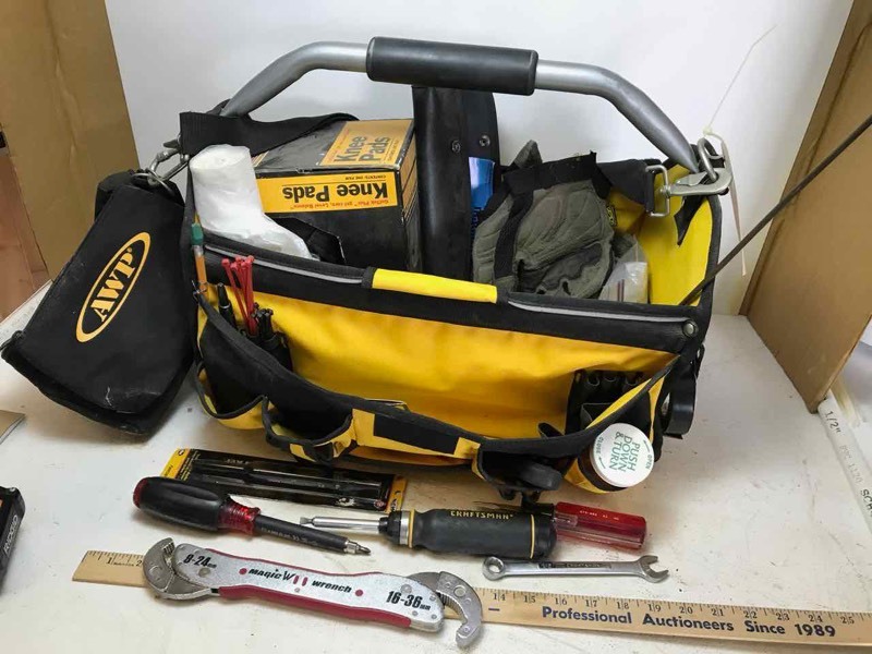 lot 693 image: Carpenters Tool Tote knee pads, wrenches, gloves, screwdriver, etc.