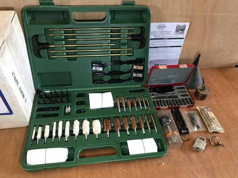 lot 750 image: Guide Gear multi-caliber cleaning kit and box of assorted tools