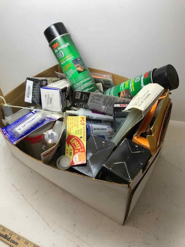 lot 797 image: Box of assorted glues and adhesives