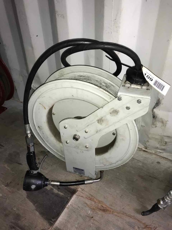 lot 109 image: An American Hose Reel & Oil Filler Hose with Nozzle