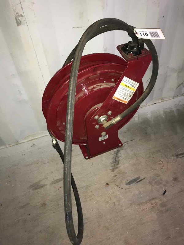 lot 110 image: Red Hose Reel with Hose