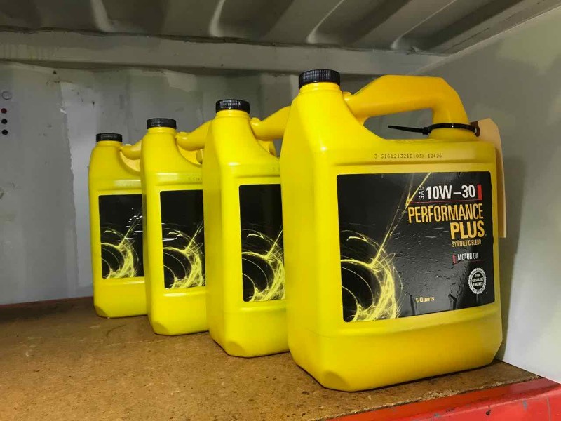 lot 238 image: (4 Jugs)  Performance Plus Synthetic Blend Oil SAE 10W-30