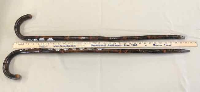 lot 85 image: (2) German Walking Sticks