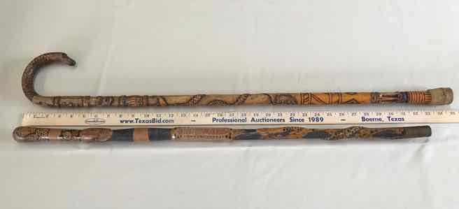 lot 123 image: (2) Canes Carved Snakes