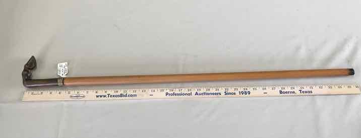 lot 141 image: Antique Cane  Circa 1890, Carved Horn of Horses Foot Howe (from Grand Imperial Collection, Silverton CO.)