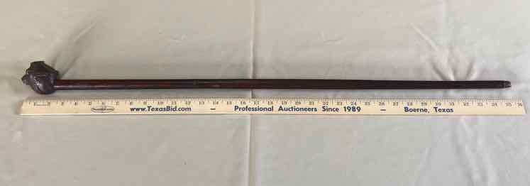 lot 177 image: Antique Walking Stick  Bull with White Eyes
