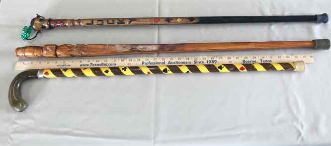 lot 192 image: (3) Gaming Themed Canes (dicecards)