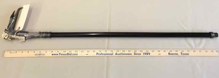 lot 199 image: Cane Alien Skull, Sword