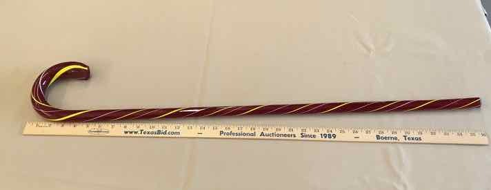 lot 210 image: Cane Thick Red Glass, Yellow & White Stripes