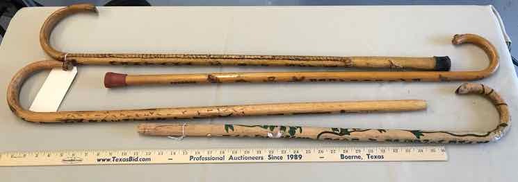 lot 216 image: (4) Canes Carved (Love, Railroads, Carpenter, Montana)