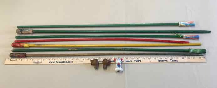 lot 228 image: (7) Carnival Cane Sticks, (3) loose toppers
