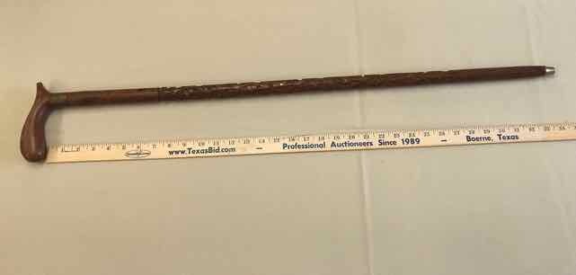 lot 236 image: Cane Carved LeavesFlowers with Inlaid Hearts of Brass
