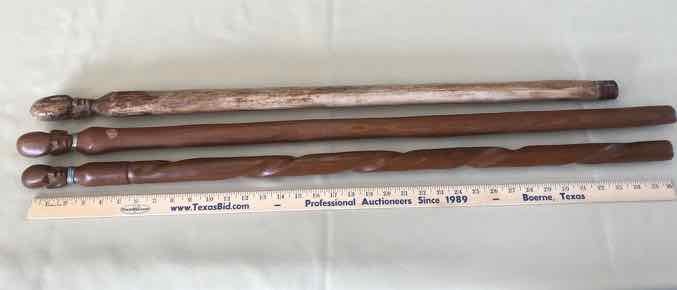 lot 247 image: (3) Canes Kenya Carved Face