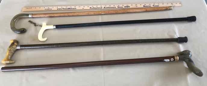 lot 259 image: (4) Canes Plastic Handles