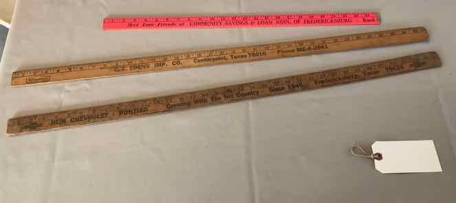 lot 271 image: (2) Yard Sticks Hein Chevrolet-Pontiac Fredericksburg TX & C.E. Edens Centerpoint TX