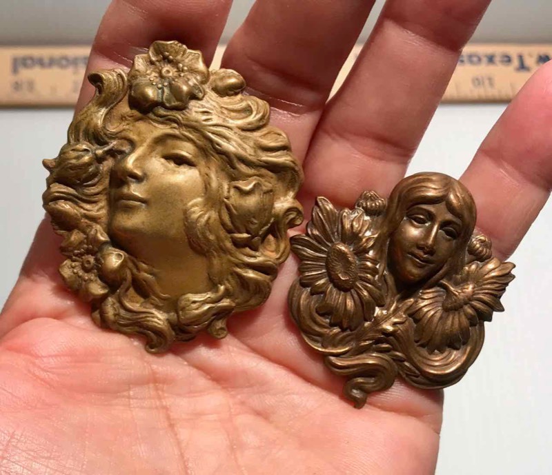 lot 320 image: (2) Hat Pins Pressed Metal (Flowing Hair with Flowers)