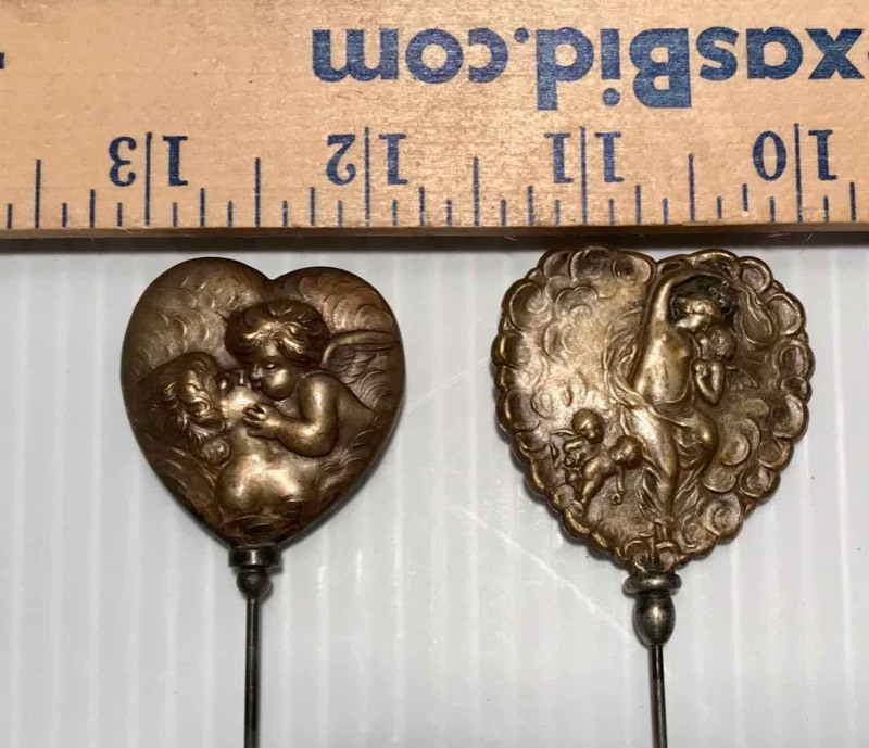 lot 323 image: (2) Hat Pins Heart Shaped with Cupids