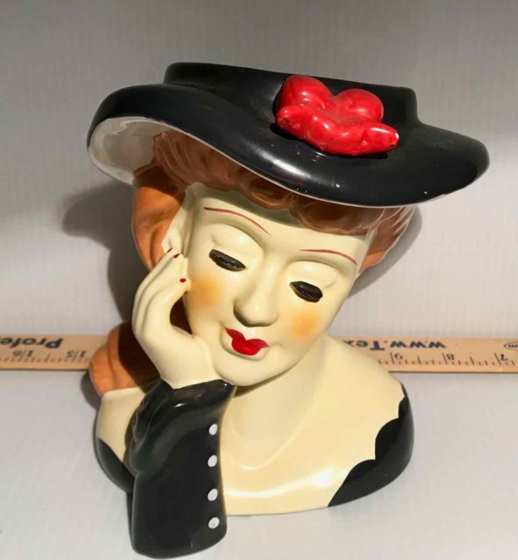lot 337 image: Vintage Art Pottery Head Vase Black Hat with Red Bow
