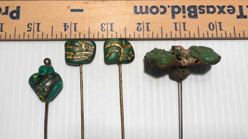 lot 385 image: (4) Hat Pins  Greens, PlasticGlass