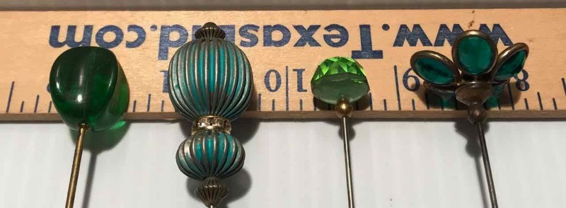lot 387 image: (4) Hat PinsGreens, GlassMetalStone