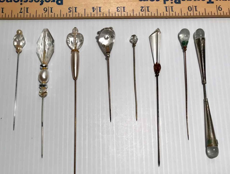 lot 412 image: (8) Hat Pins Clear PlasticAcrylicGlass