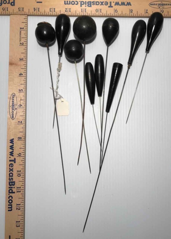 lot 414 image: (10) Hat Pins Black, Wood