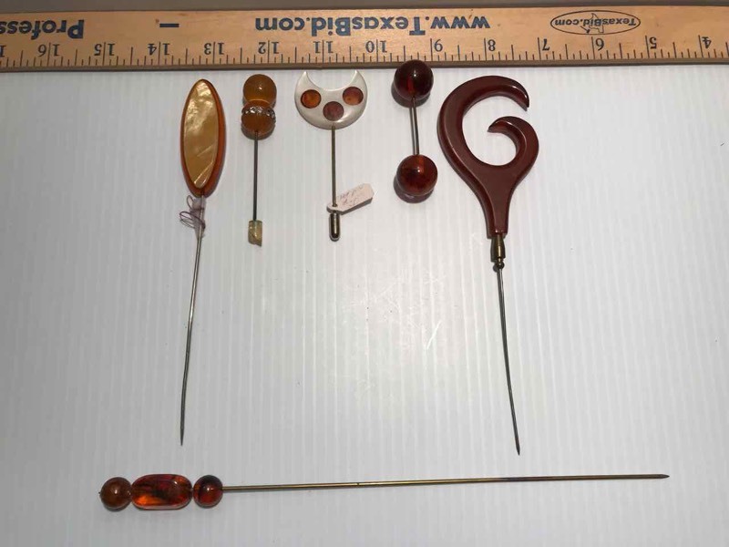 lot 425 image: (6) Hat Pins CelluloidPlastic (brownsamber color)