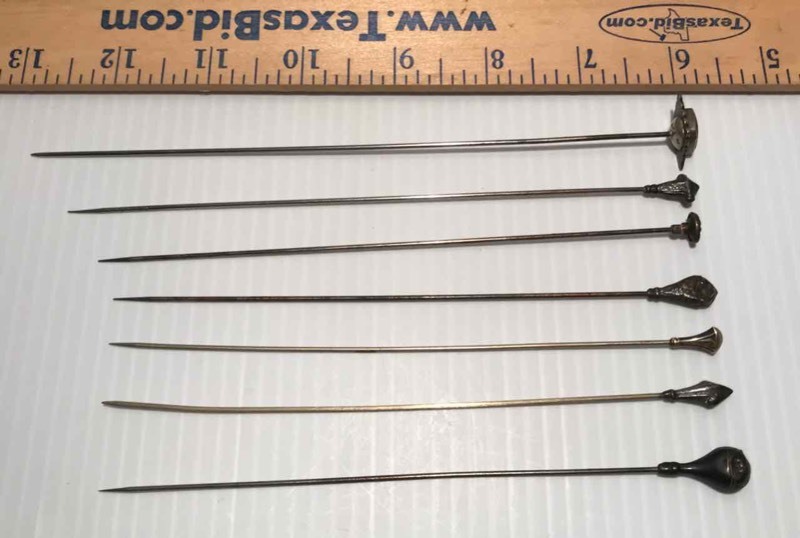 lot 438 image: (7) Hat Pins Silver in Color