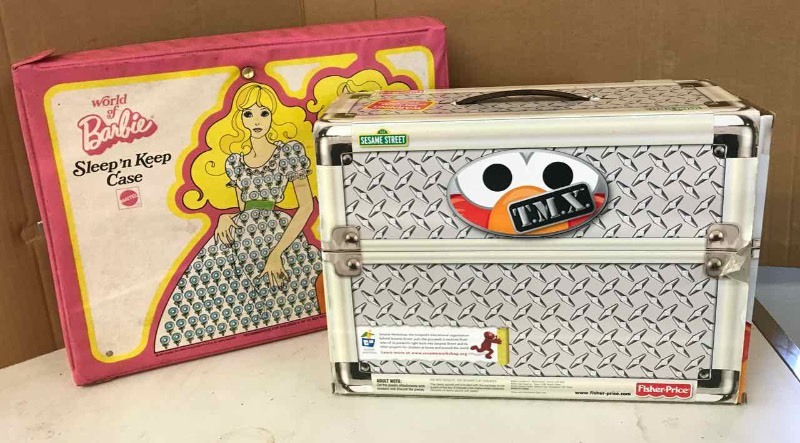 lot 636 image: Tickle Me Elmo, 10th Anniversary Edition & a Barbie Case