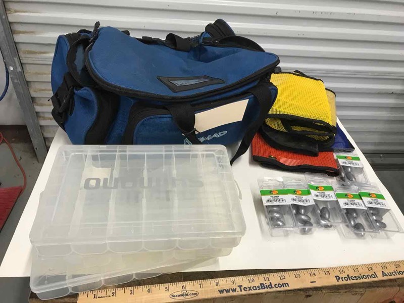 lot 656 image: Nomad Canvas Tackle Box, Lead Weights, Lure Bags