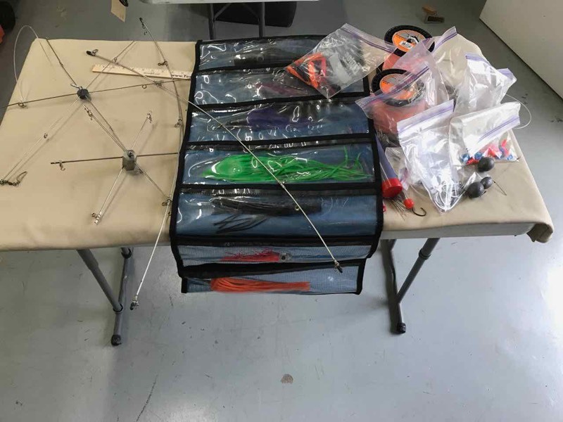 lot 660 image: (2) Dredges, Lure Bag, Lures, Weights, Braided Leader Line